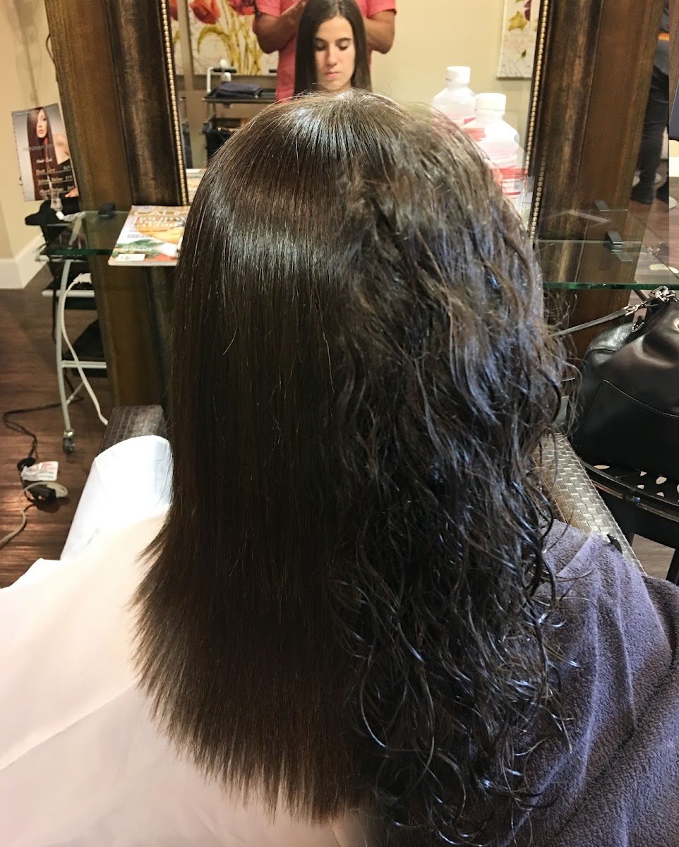 Before: curly, frizzy hair ahead of straightening
